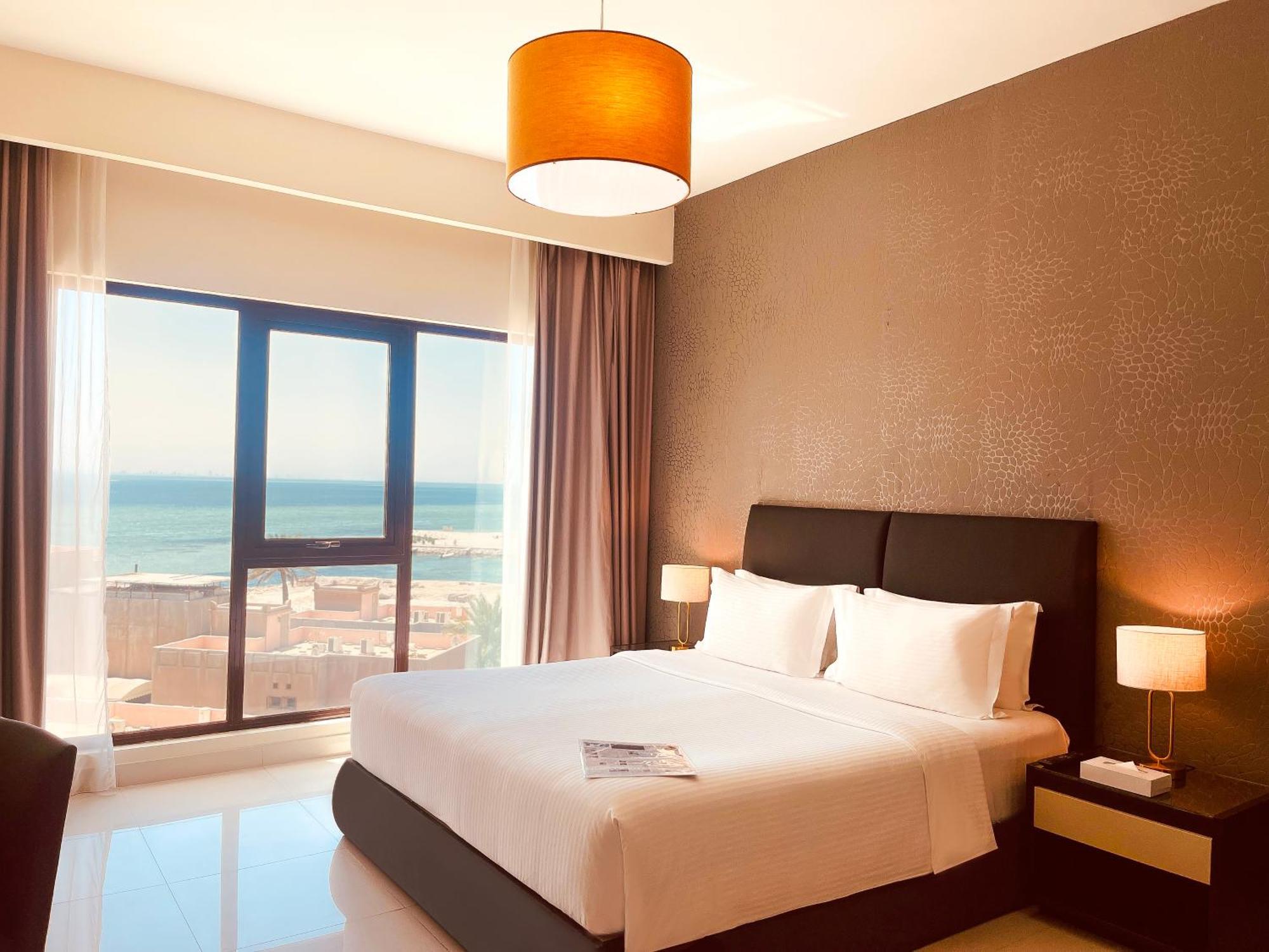 מנאמה Lagoona Beach Luxury Resort And Spa מראה חיצוני תמונה A bedroom at the hotel